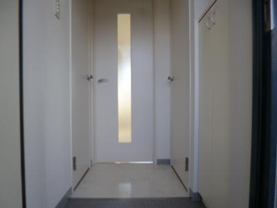 Entrance. With cupboard