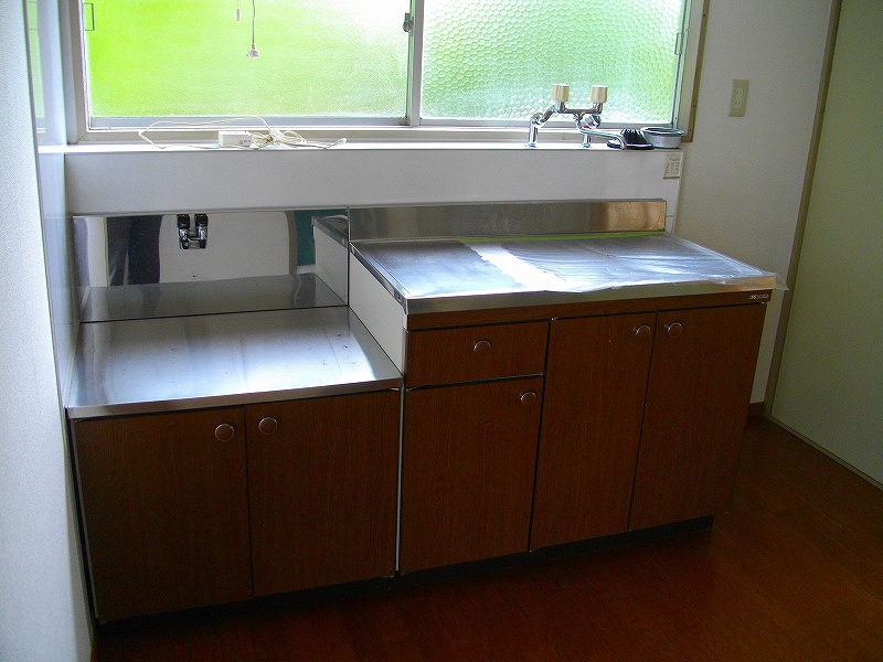 Kitchen. Windows have the kitchen sink