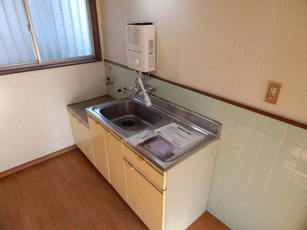 Kitchen. It is bright with bay window kitchen
