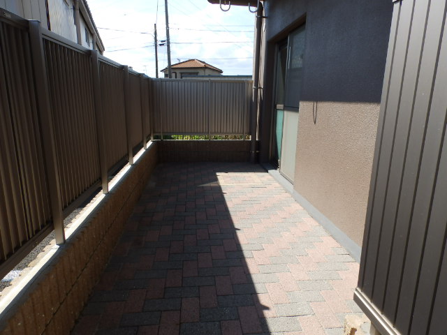 Balcony. There are door to go to the parking lot from the private terrace