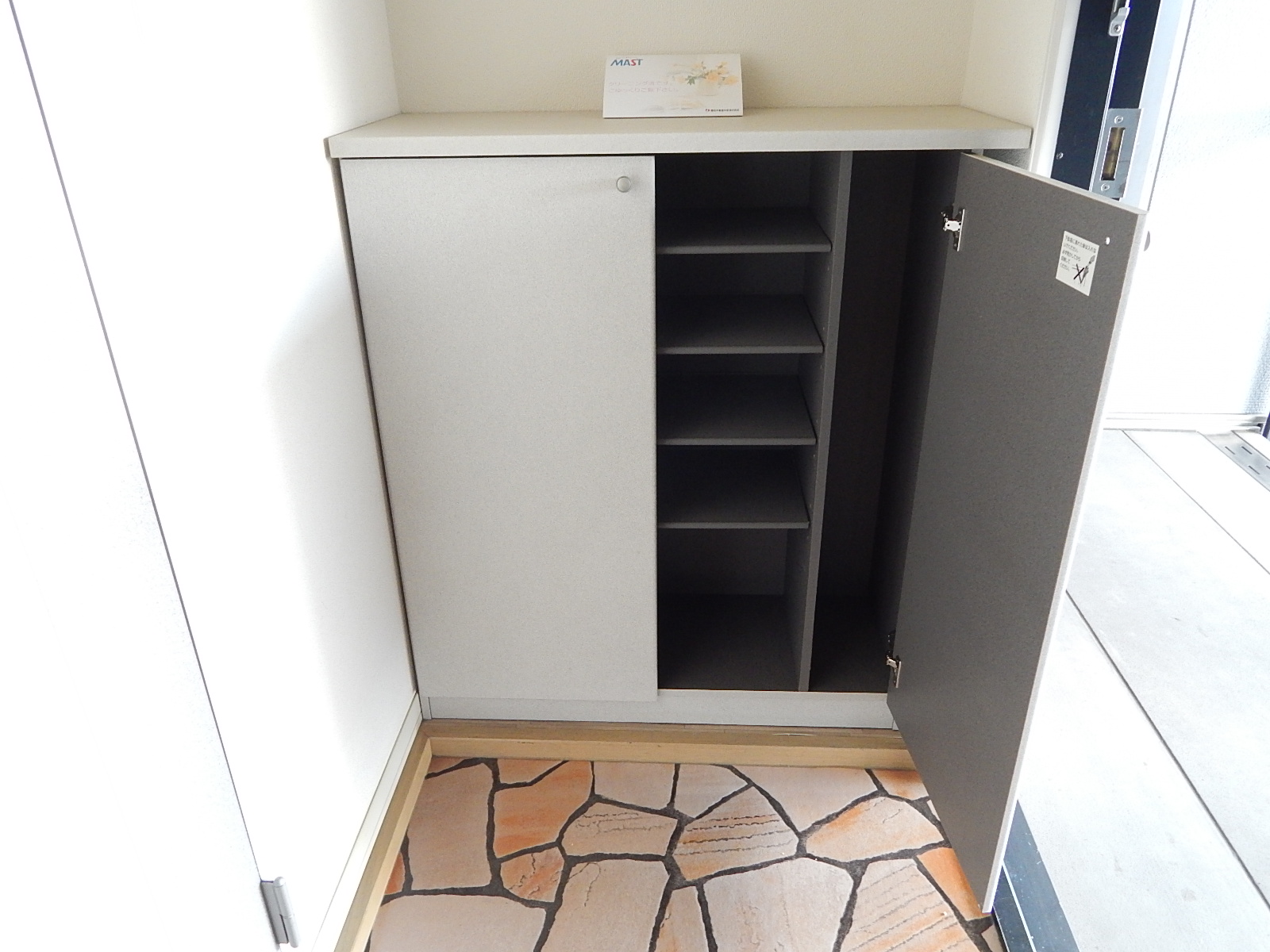 Entrance. Brightly, Wide is the entrance with a cupboard