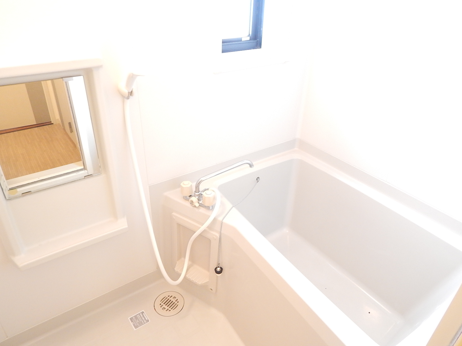 Bath. Madogatsui on bright bathroom