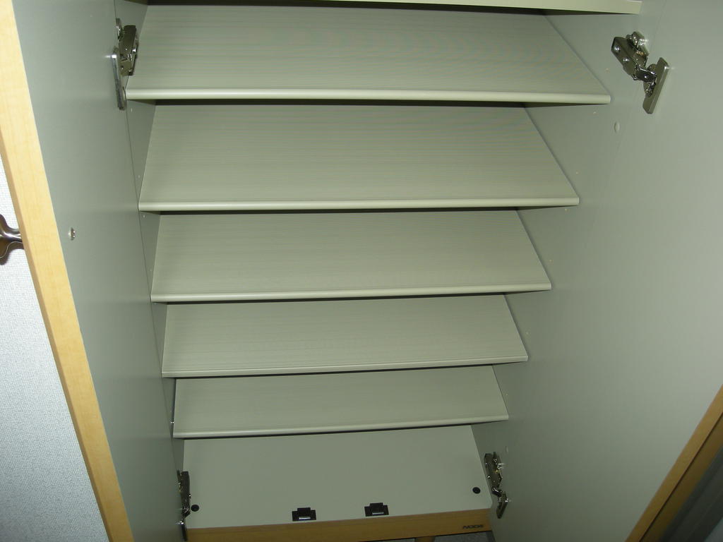 Entrance. Lot I can shoes storage (107 Room No.)