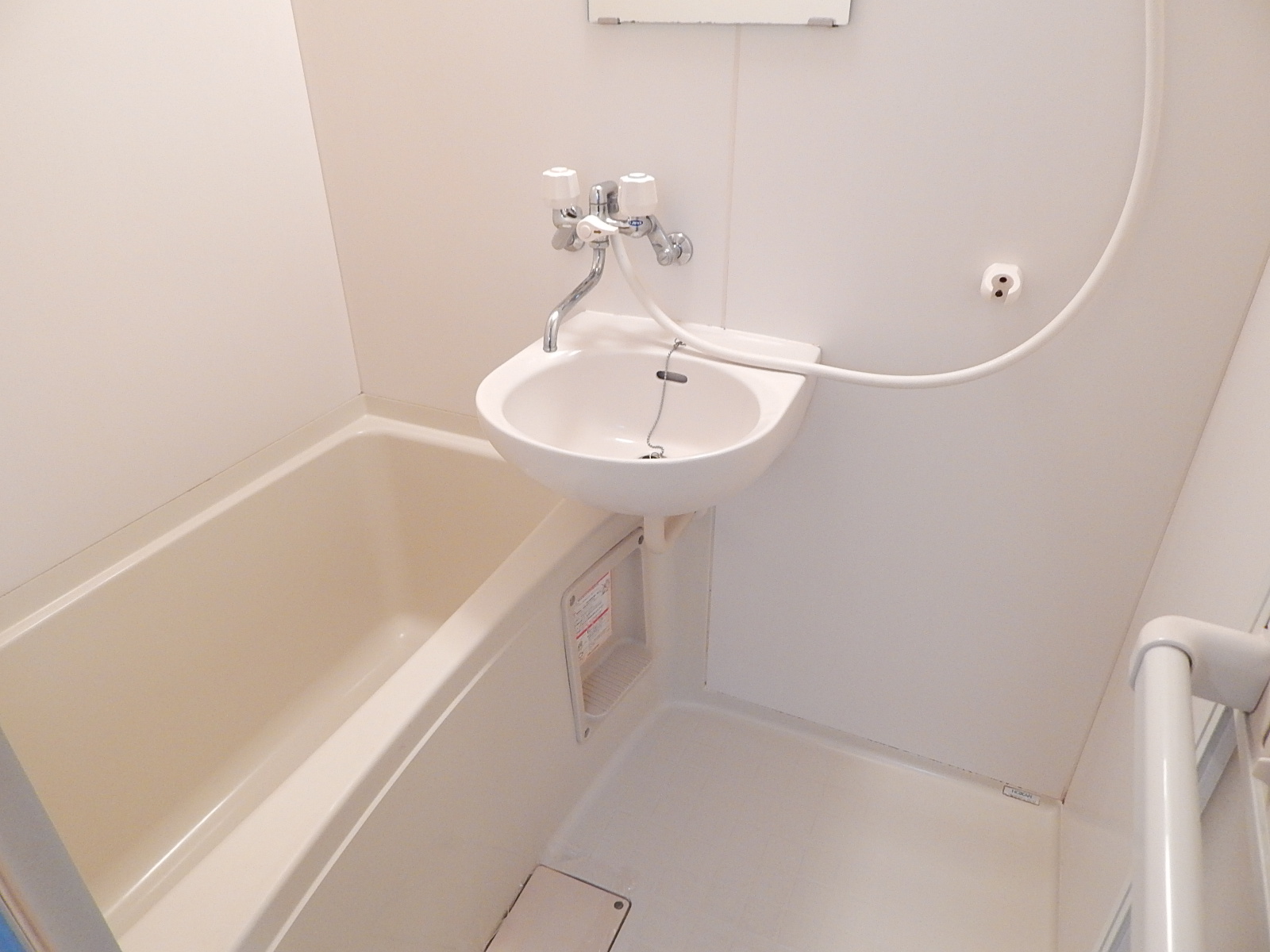 Bath. Separate type bathroom is with a washbasin