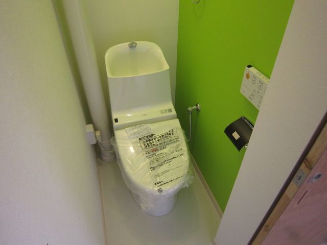 Toilet. With popular warm water cleaning toilet seat!