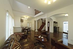 Open kitchen is continuous in the dining open first floor atrium overlooking from the edge of the living room