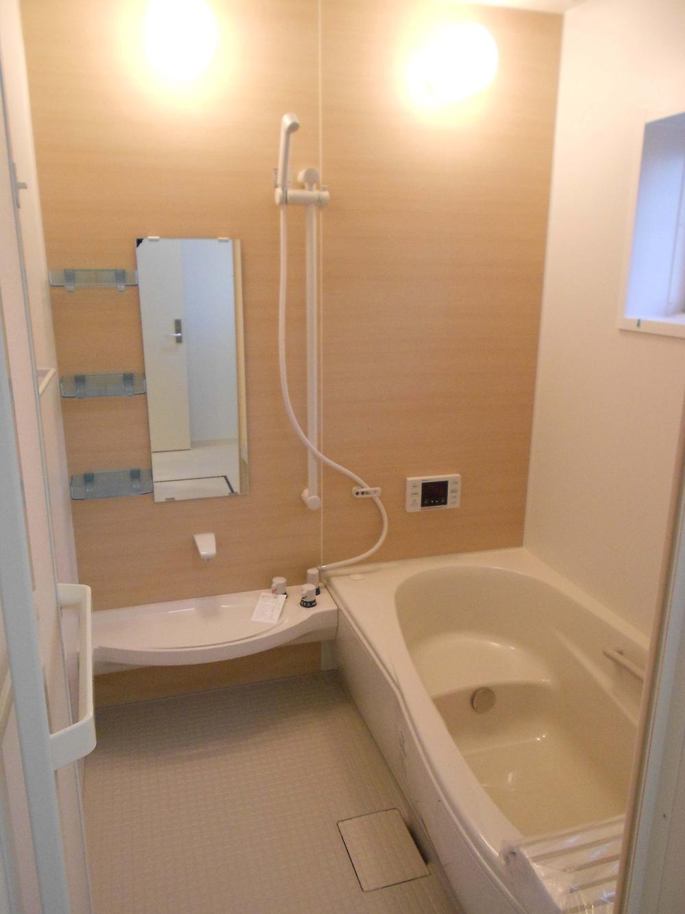 Bathroom. Bathroom to heal fatigue of the day. Panel of wood is the accent!