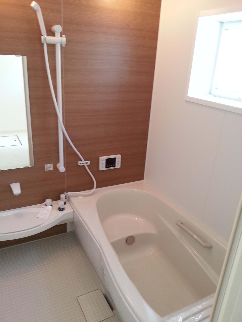 Bathroom. Bathroom to heal fatigue of the day. Panel of wood is the accent!