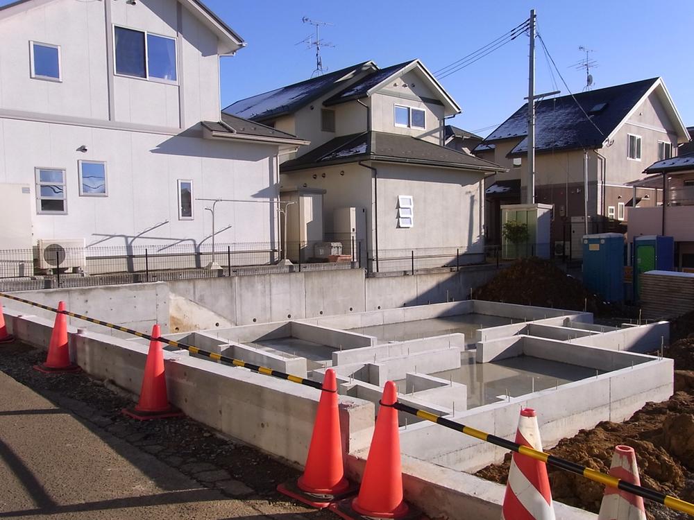 Local appearance photo. Building B / Foundation work in.