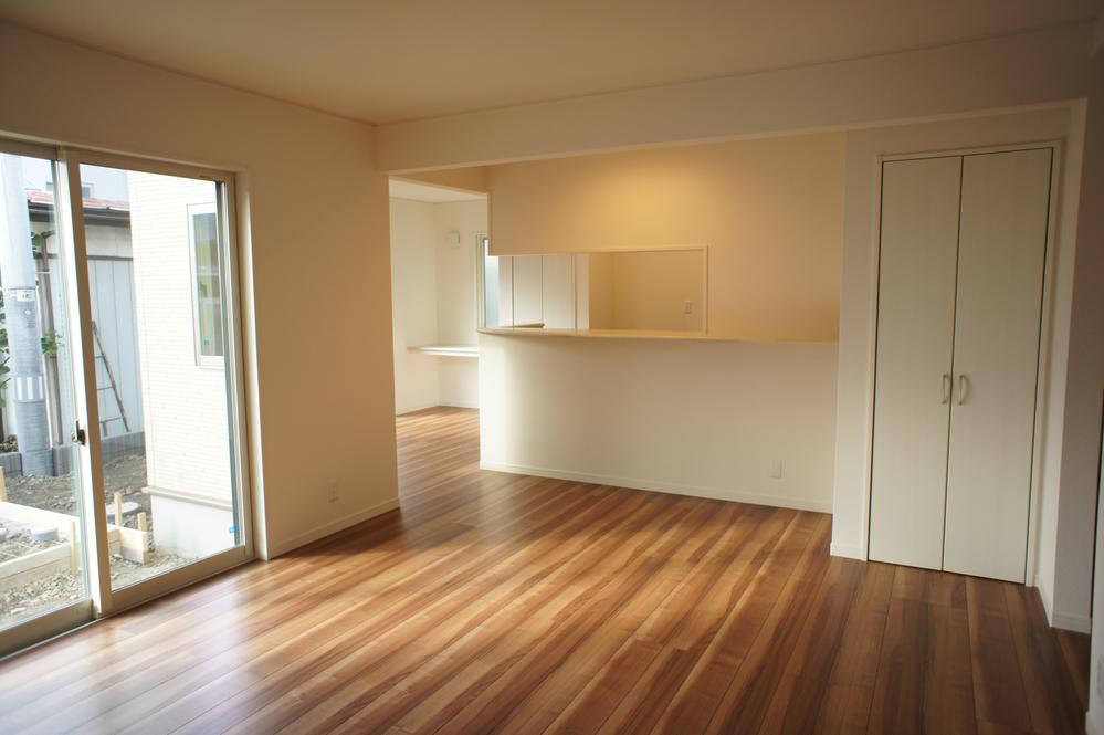 Living. Spacious living room. Flooring use of waxing unnecessary.