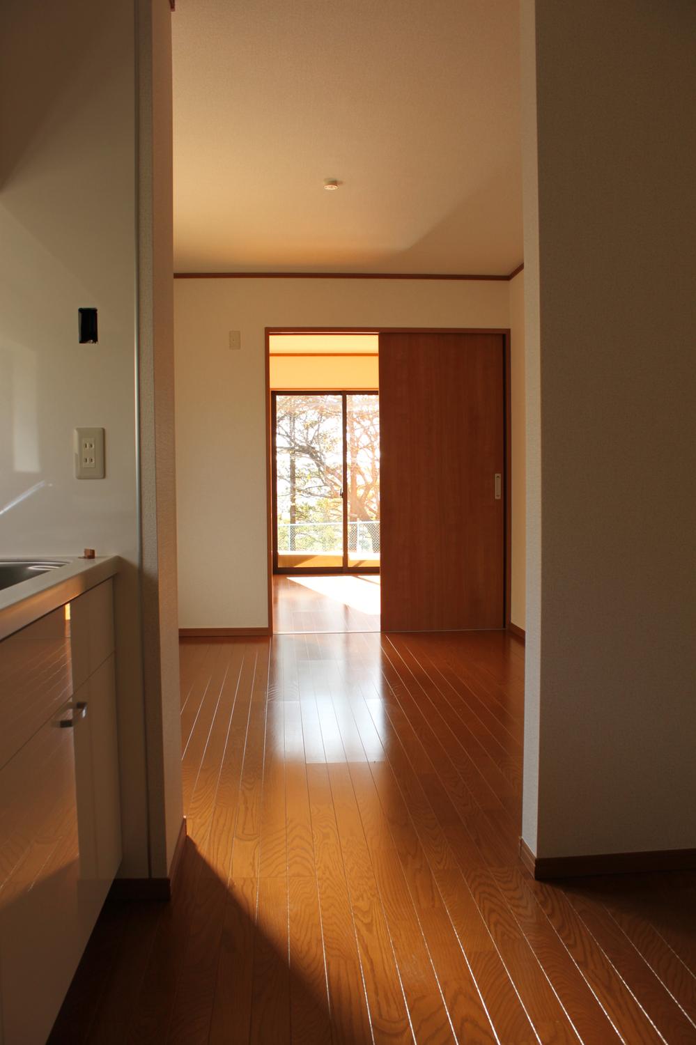 Living. Kitchen → Dining → Living