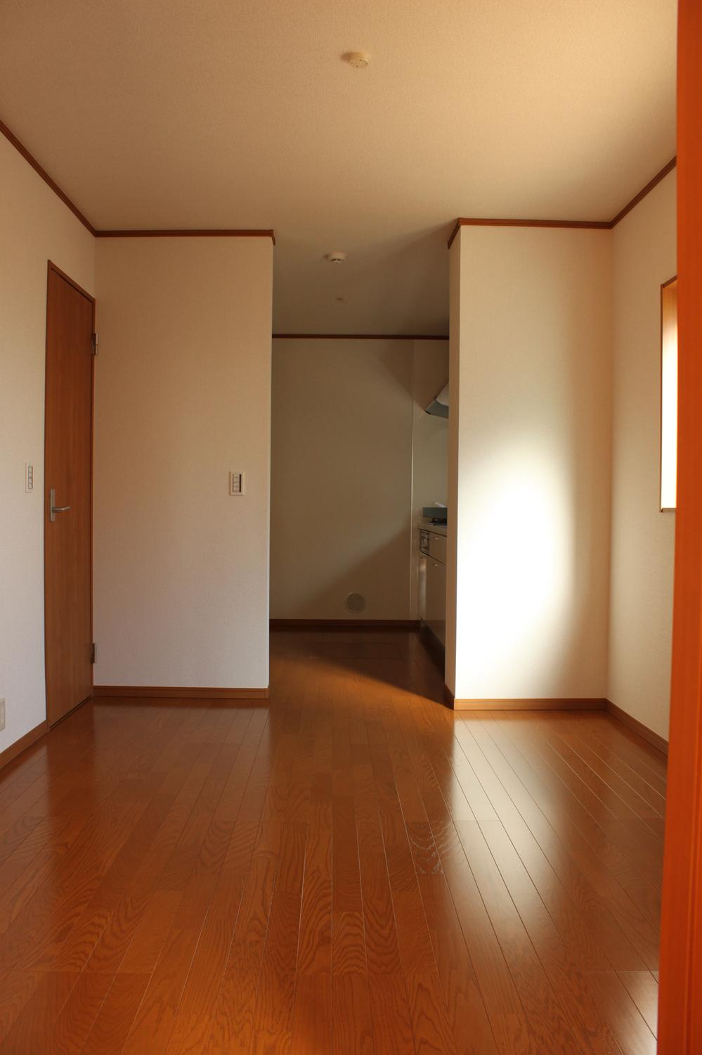 Living. Kitchen from dining