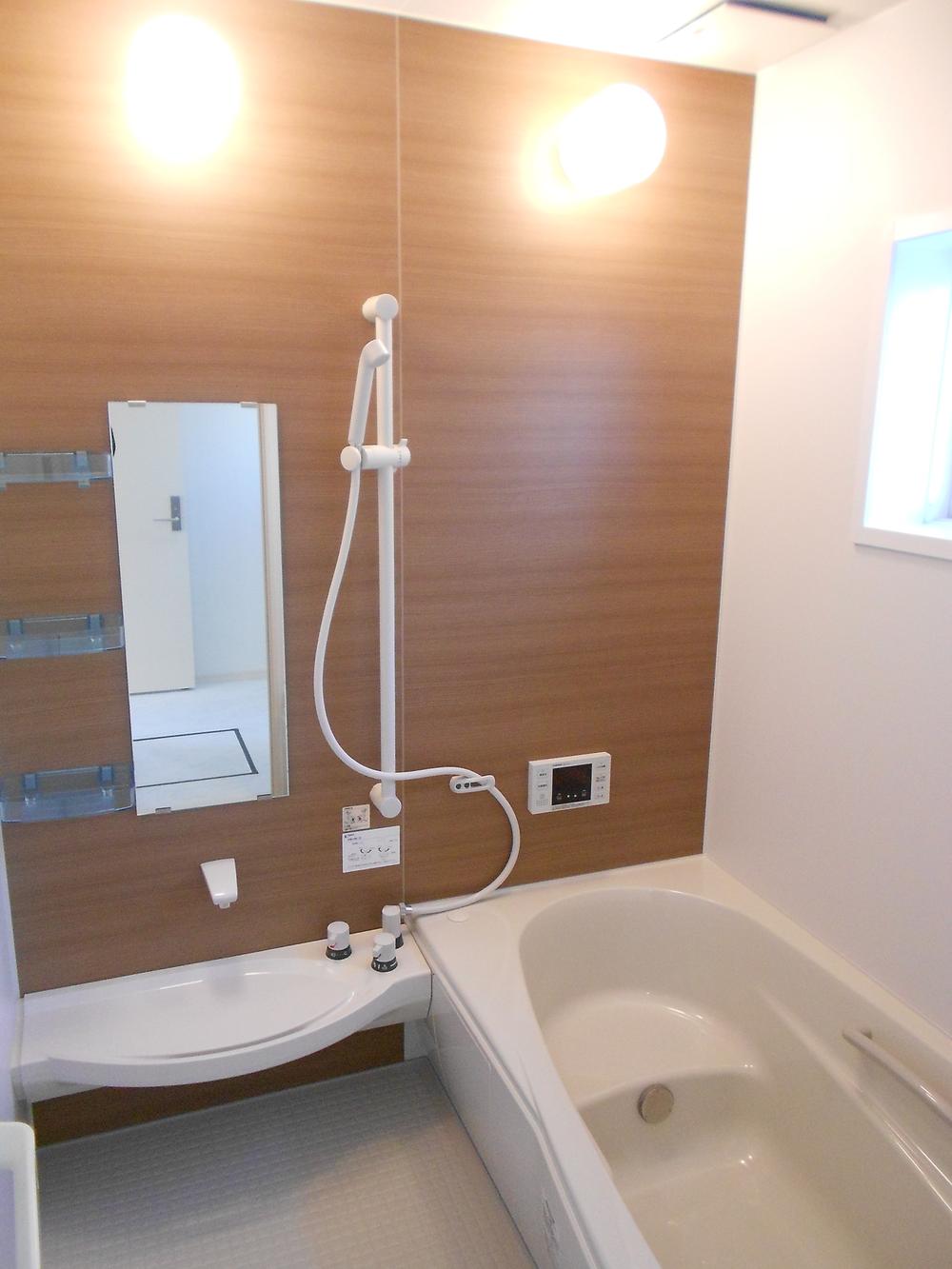 Bathroom. Bathroom to heal fatigue of the day. Panel of wood is the accent!