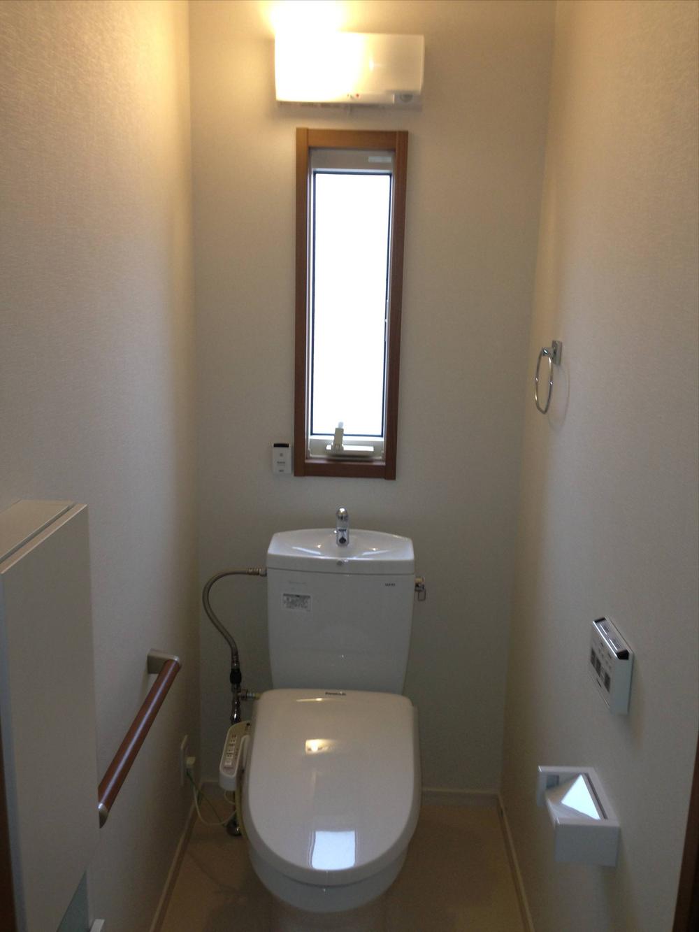 Toilet. Toilet with hot water cleaning toilet seat. Lighting is also a wonderful point with a sensor. (March 2013) Shooting