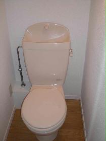 Toilet. It is a bus and another is happy