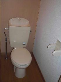 Toilet. It is a bus and another is happy