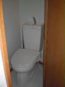 Toilet. toilet, It is by bus