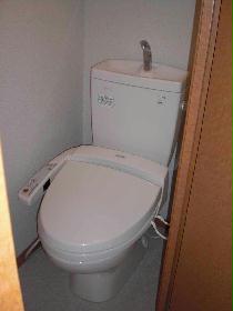 Toilet. It is warm water toilet seat toilet.