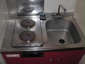 Kitchen. With a two-necked electromagnetic grill