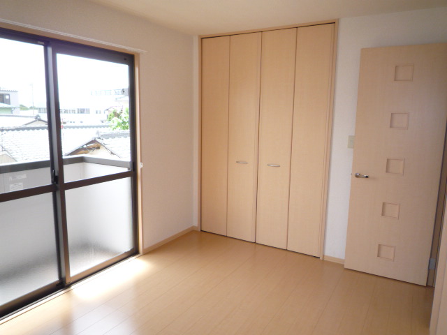 Other room space. Flooring, It was to posting the color of the closet also bright