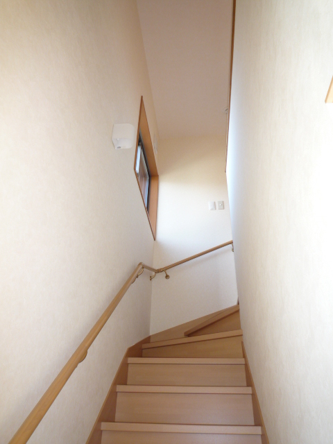 Other room space. Around the stairs