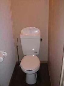 Toilet. It is a bus and another is happy