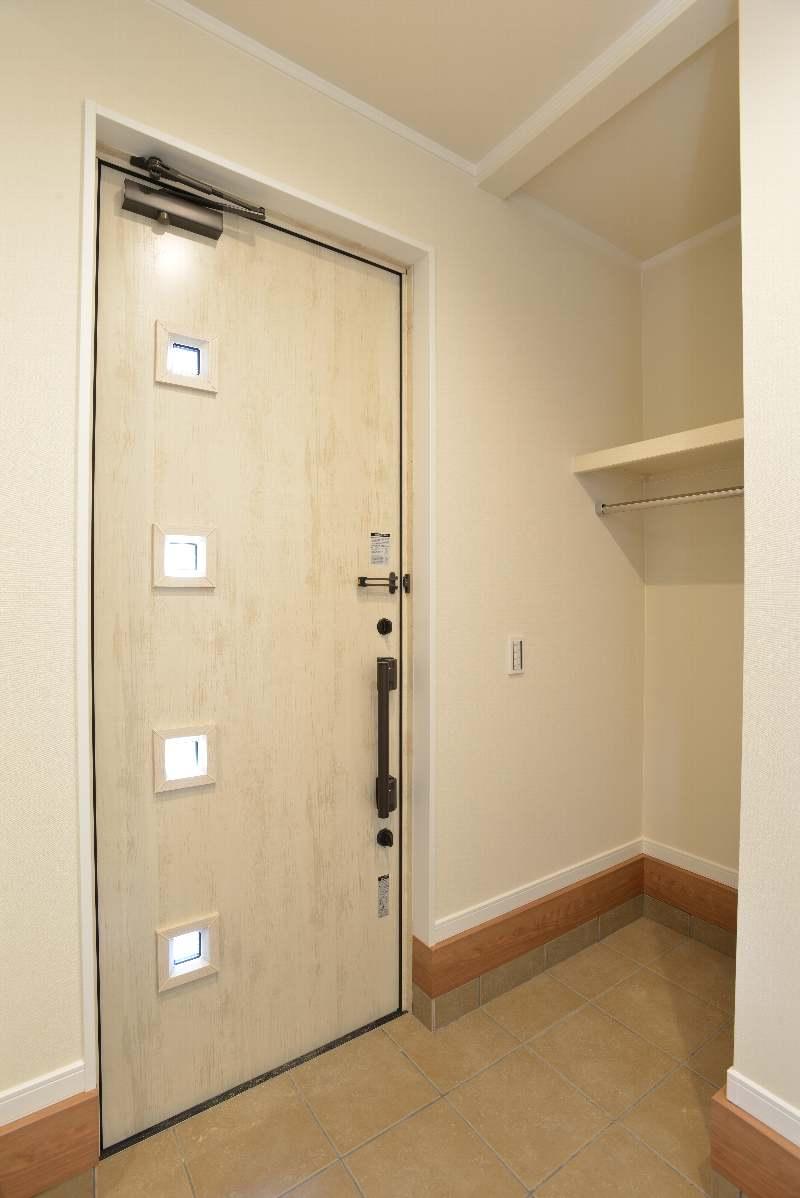 Entrance. Raincoat and umbrella wet, Etc. children's tricycle and stroller