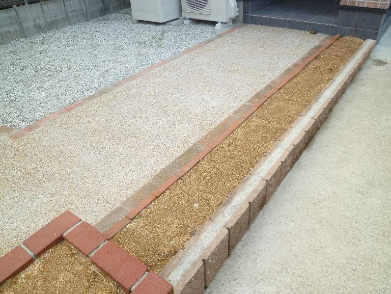 Other. Flower bed space in the front door approach