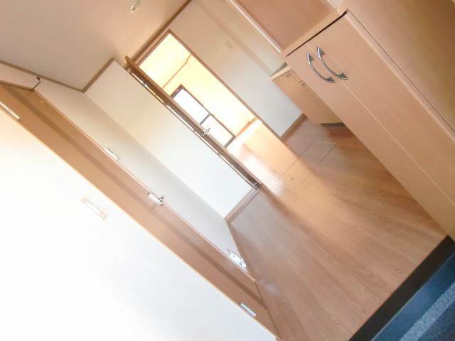 Entrance. With a shoe box