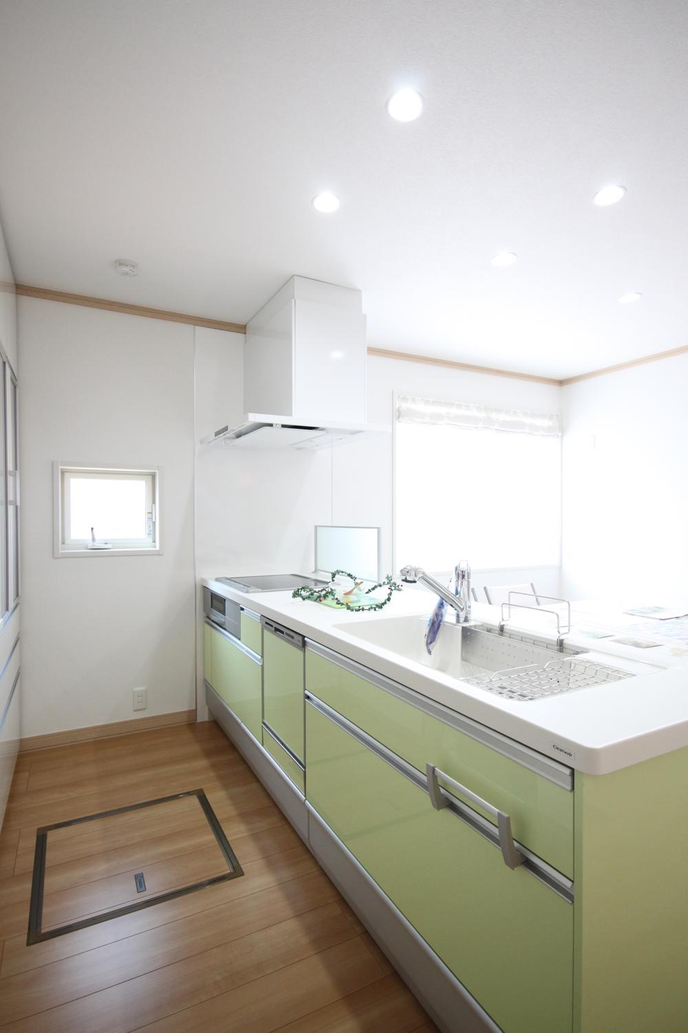 Kitchen. Vitamin open kitchen of color invigorating. Artificial marble countertops will attract the eye.