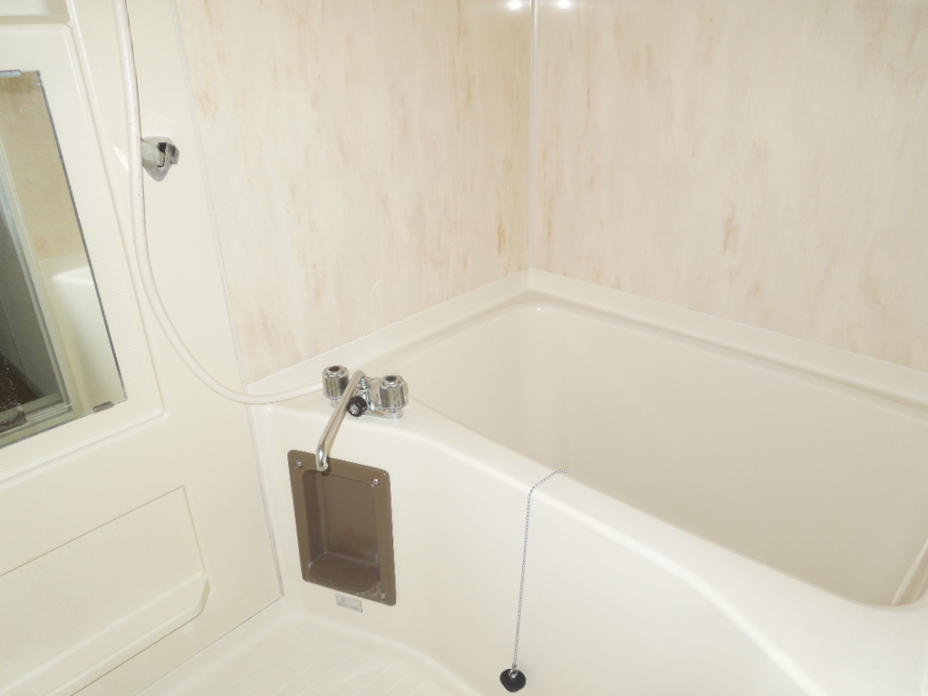 Bath. (It is a photograph of the 102 in Room)