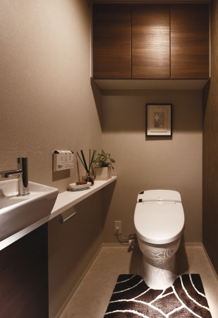 Toilet.  [Water-saving type of tankless toilet (standard adopted)] Clean design of the tankless toilet. Beautifully to look, Easy to clean. With a convenient auto-cleaning function.