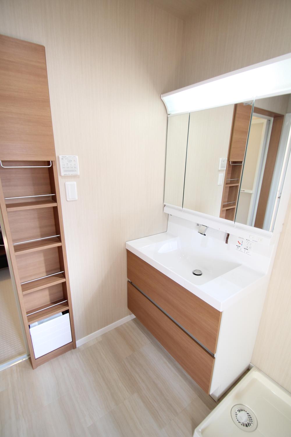 Wash basin, toilet. Wide vanity, Storage is also plenty of.