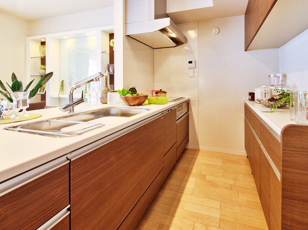 Kitchen.  [kitchen] Fun to cook and clean up after, Enlightenment kitchen conversations with family. Adopting the current plate with range hood of simple design in pursuit of functionality and design. System kitchen work top, Adopt the artificial marble drifting sophisticated atmosphere with excellent durability.