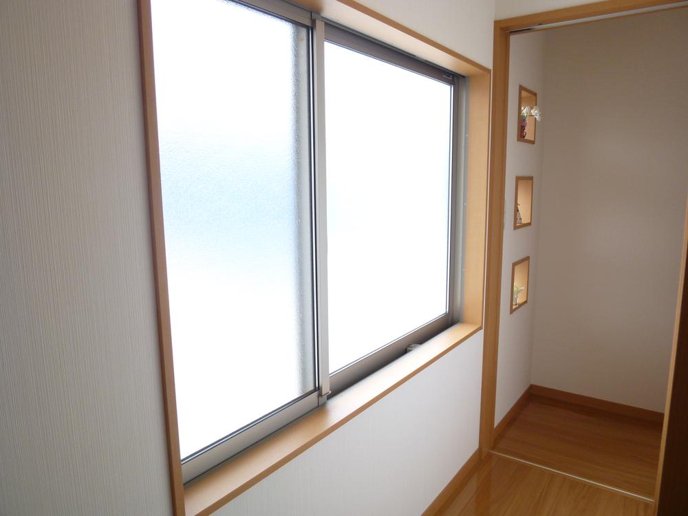 Other. The second floor of the hallway to the large window