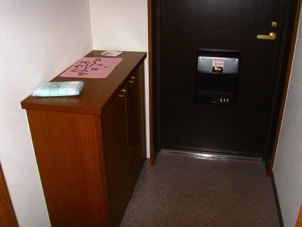 Entrance. Shoe box is of course larger