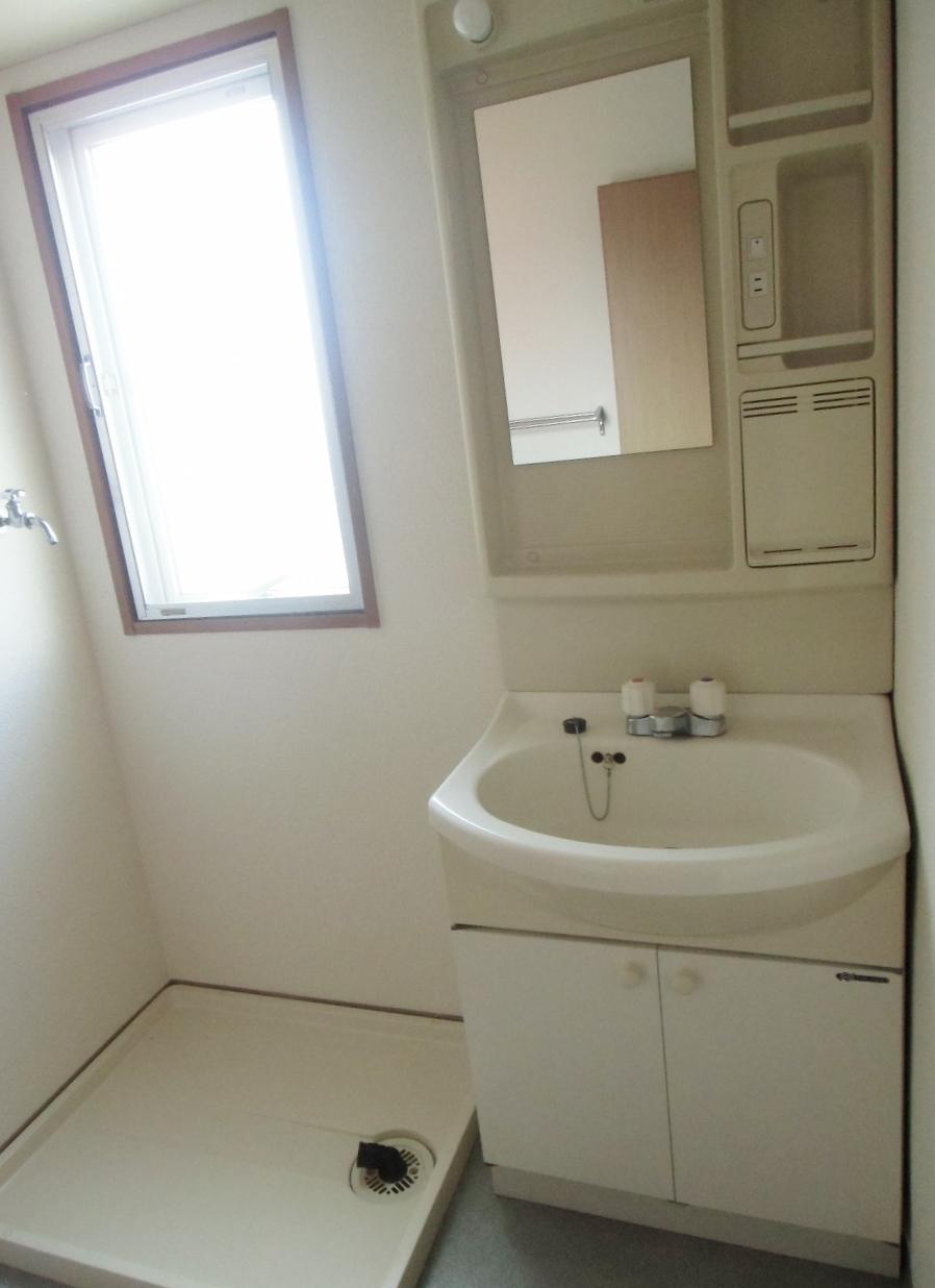 Washroom. It is very bright because there is a window in washroom