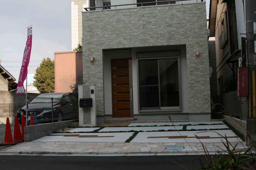 Local photos, including front road. Garage parking 2 cars