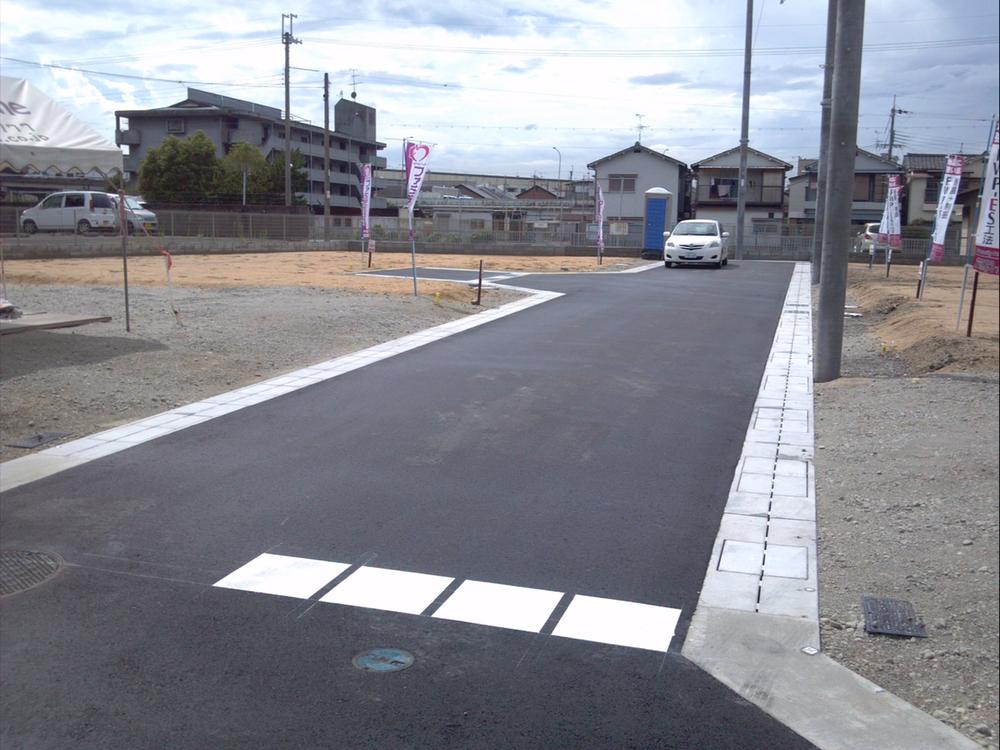 Local photos, including front road. Local construction completion