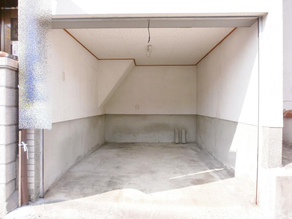 Parking lot. Shutter garage