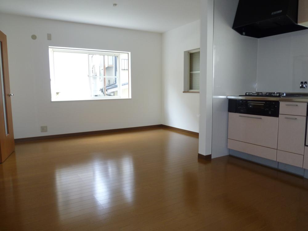 Living. Large living in the daylight from two directions is perfect for the space of the family hearthstone. 