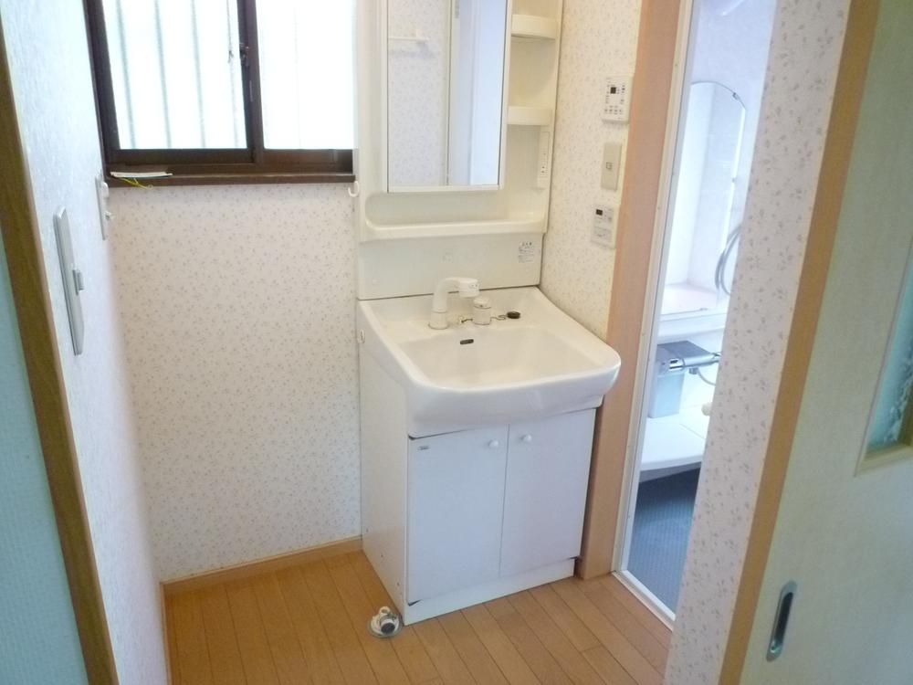 Wash basin, toilet. Already washroom also renovated