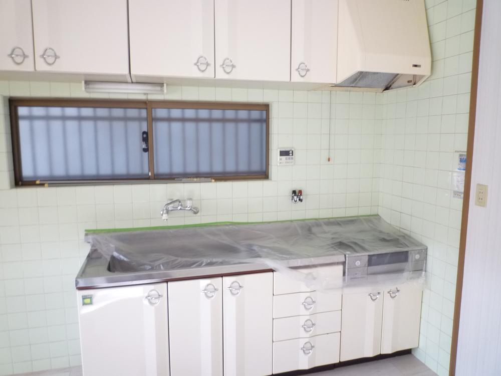 Kitchen. South-facing living room is sunny