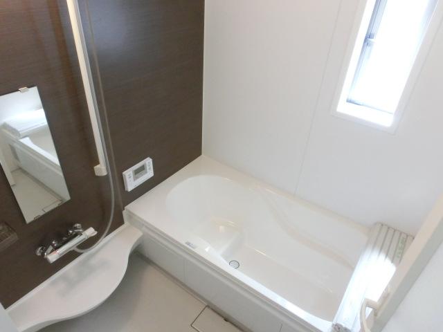 Bathroom. Comfortable bath time in the bathtub with a bathroom dryer