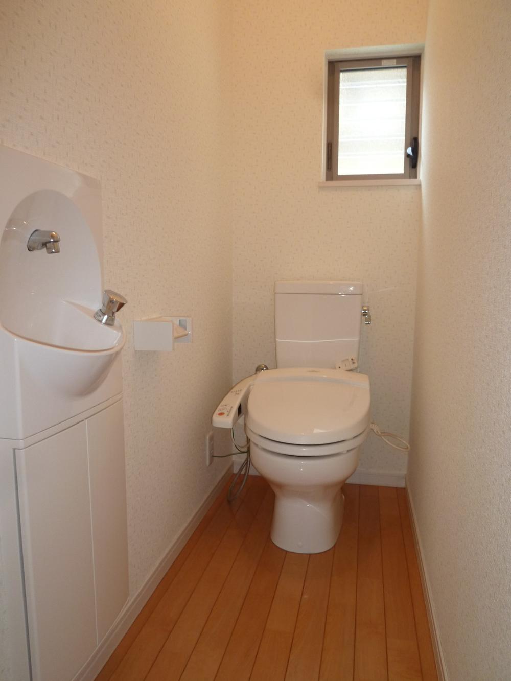 Toilet. Toilet with hand washing is something useful