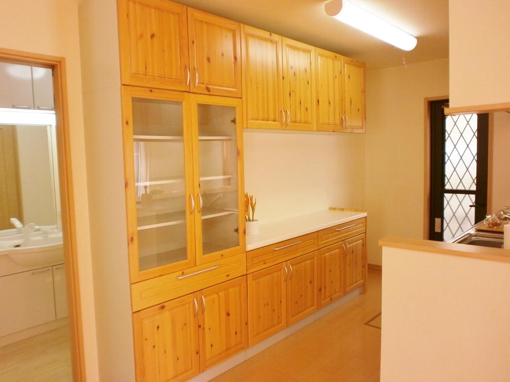 Kitchen. Cute cupboard in the kitchen the same material