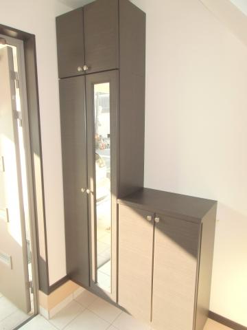 Entrance. There are shoes BOX