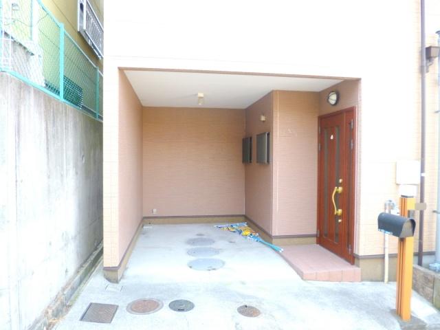 Entrance. There is garage with roof