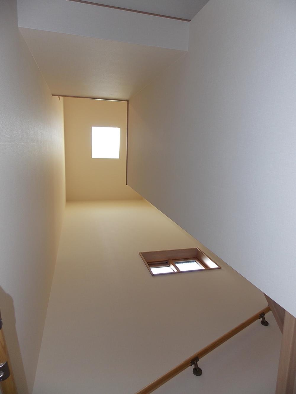 Other. Than the skylight of stairs, Bathed in soft light.