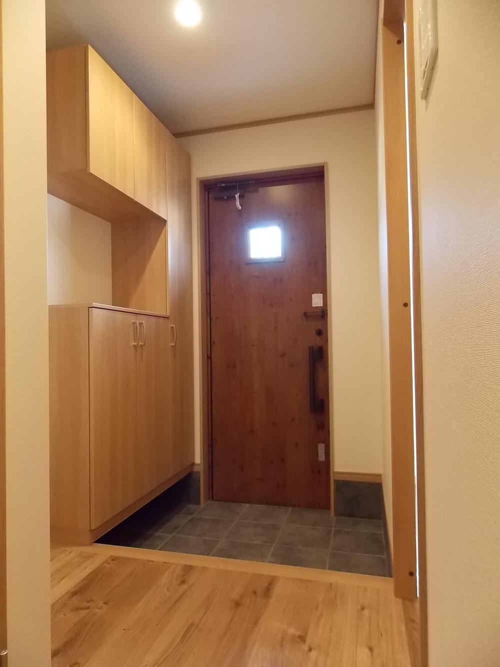 Entrance. Entrance a warm woodgrain.